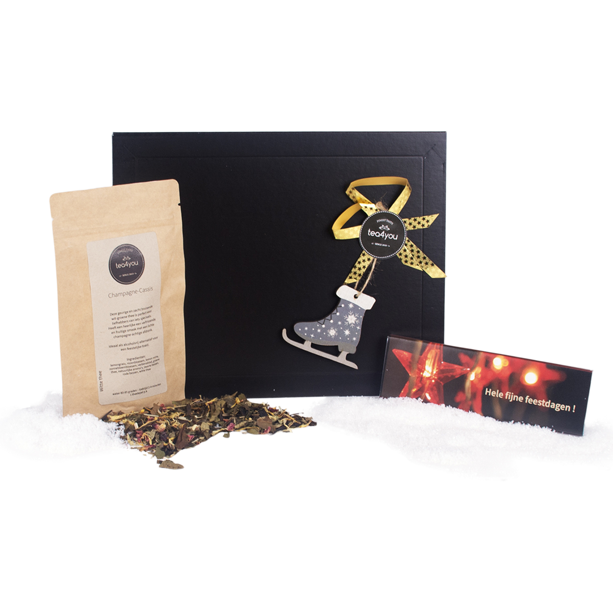 Brievenbus kerstcadeautje met thee en chocolade - Schaats